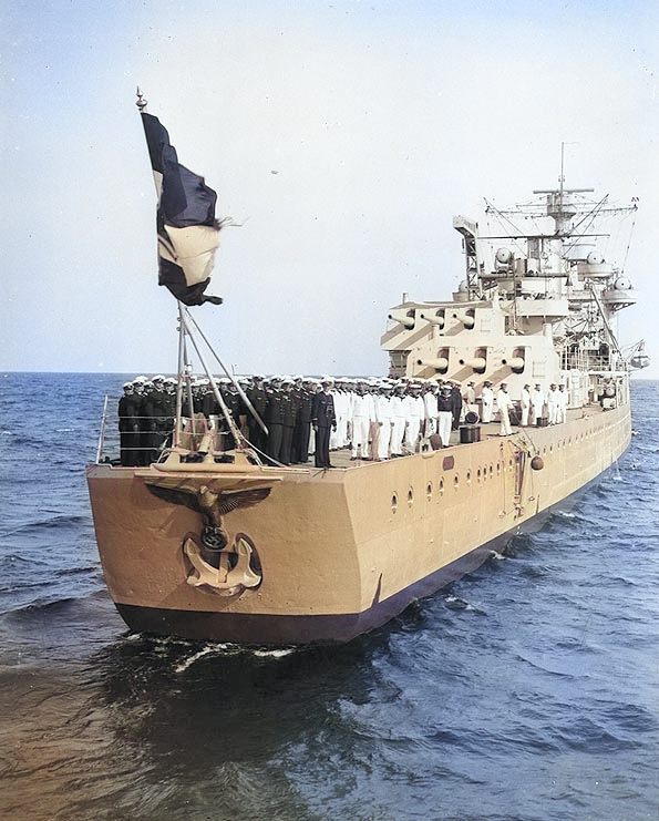 View of the stern of light cruiser Köln, with men manning her rails, 1935 [Colorized by WW2DB]