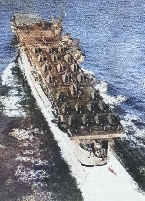French carrier La Fayette arriving in France, 11 Sep 1951; note F6F-5, F6F-5N, and TBM-3E aircraft on flight deck; seen in Nov 1951 issue of US Navy Naval Aviation News [Colorized by WW2DB]