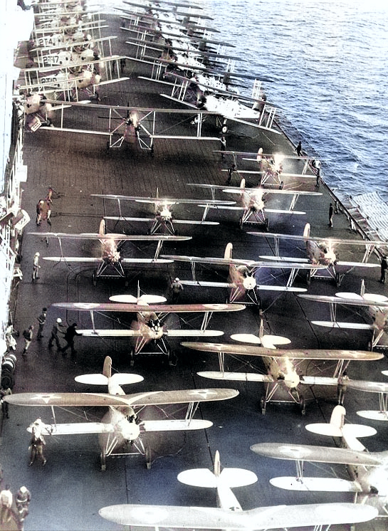 Aircraft on the flight deck of Saratoga, preparing for launching, circa 1929-30 [Colorized by WW2DB]