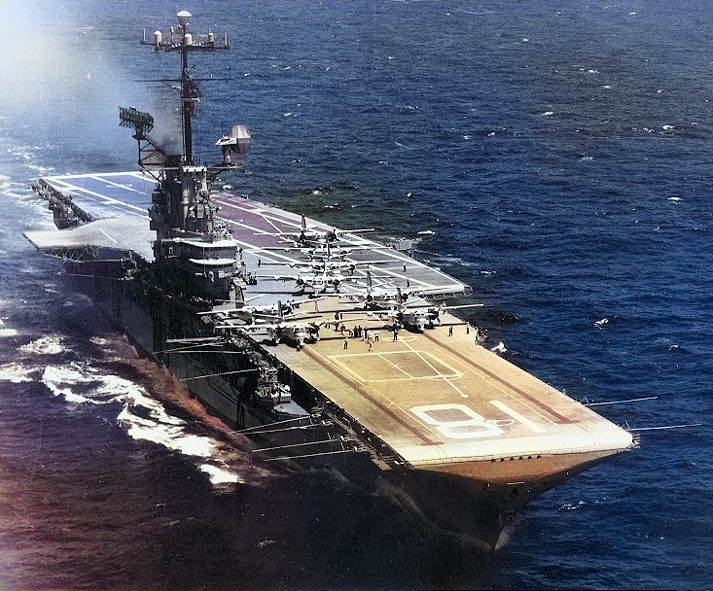 USS Wasp underway, circa early 1967; note S-2E Tracker aircraft of CVSG-52 squadron on flight deck [Colorized by WW2DB]