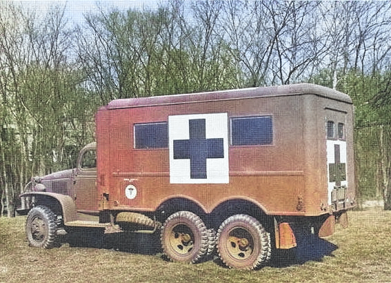 An early US Army CCKW 2 1/2-ton 6x6 long wheel-base chassis truck fitted with a Mobile Optical Repair unit for the Medical Corps, 1944-1945 [Colorized by WW2DB]