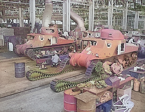 Workers putting tracks onto a M3 tank at the Detroit Arsenal Tank Plant, Warren, Michigan, United States, circa 1940-1942, photo 2 of 2 [Colorized by WW2DB]