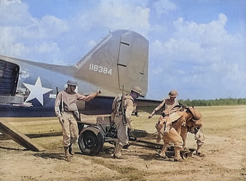 Unloading a 37 mm Gun M3 from a transport aircraft, Fort Bragg, North Carolina, United States, Sep 1942 [Colorized by WW2DB]