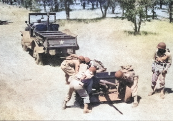 Anti-tank company of 1st Filipino Infantry Regiment in exercise with 37 mm Gun M3, 1943, photo 1 of 5 [Colorized by WW2DB]