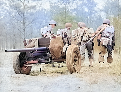 37 mm Gun M3 piece being manhandled into position, Fort Benning, Georgia, United States, Apr 1942 [Colorized by WW2DB]