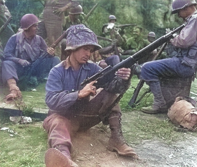 US Army Pfc. Edward J. Foley of the 143rd Infantry Regiment of the 36th Division cleaning his Springfield M1903A4 sniper rifle, near Valletri, Italy, 29 May 1944 [Colorized by WW2DB]