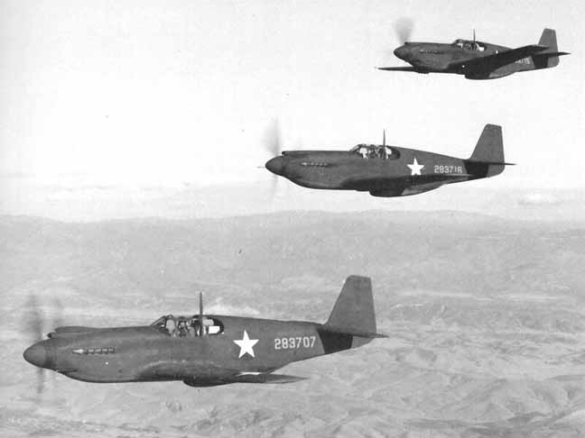 A flight of three A-36A Mustang attack aircraft on a training flight near Savannah, Georgia, United States, 1942; the lead plane was destroyed in a landing accident 8 Jan 1943