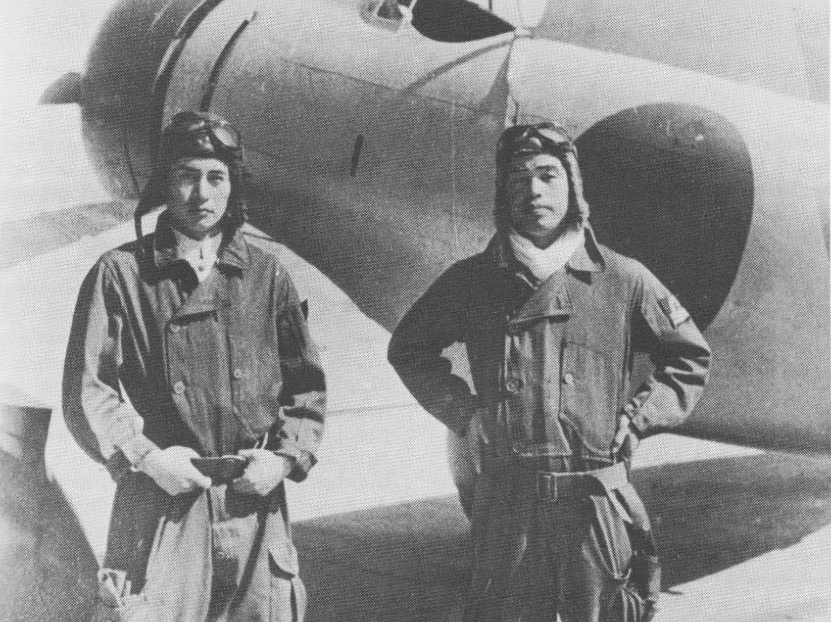 Japanese pilots Masao Asai and Masao Sato aboard carrier Akagi, 1938-1939; note A5M fighter in background