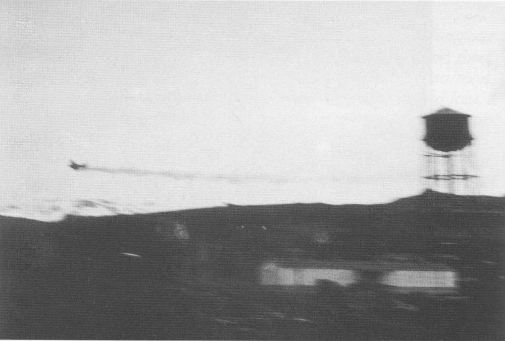 Japanese Navy Flight Petty Officer Tadayoshi Koga's A6M Zero fighter damaged by anti-aircraft fire over Dutch Harbor, US Territory of Alaska, 3 Jun 1942, photo 1 of 2
