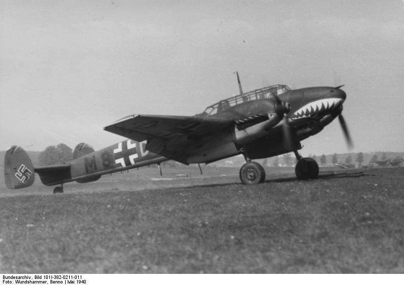 Bf 110 aircraft of German Zerstörergeschwader (Destroyer Wing) 76 preparing for flight, Western Europe, May 1940; note shark mouth marking