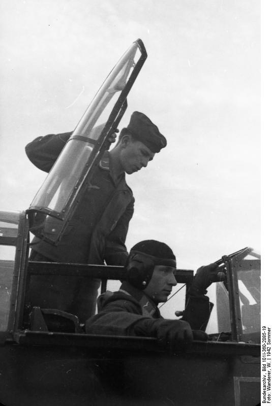A German pilot of Nachtjagdgeschwaders 4 (nightfighter squadron) in the cockpit of his Bf 110 aircraft, France, summer 1942
