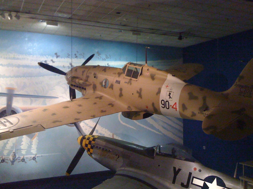 Italian C.202 Folgore fighter on display at Smithsonian National Air and Space Museum, Washington DC, United States, 26 Dec 2011, photo 2 of 2; note US P-51 Mustang fighter in background