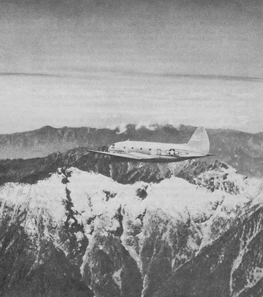 C-46 Commando aircraft flying over the Himalaya Mountains, 1943-1945