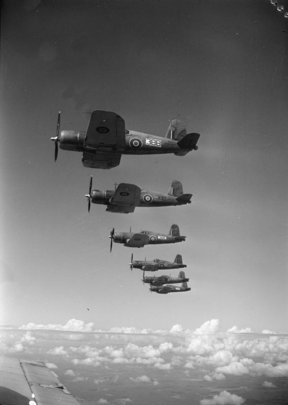 Six British Royal Navy Corsair fighters flying in formation, Nov 1944