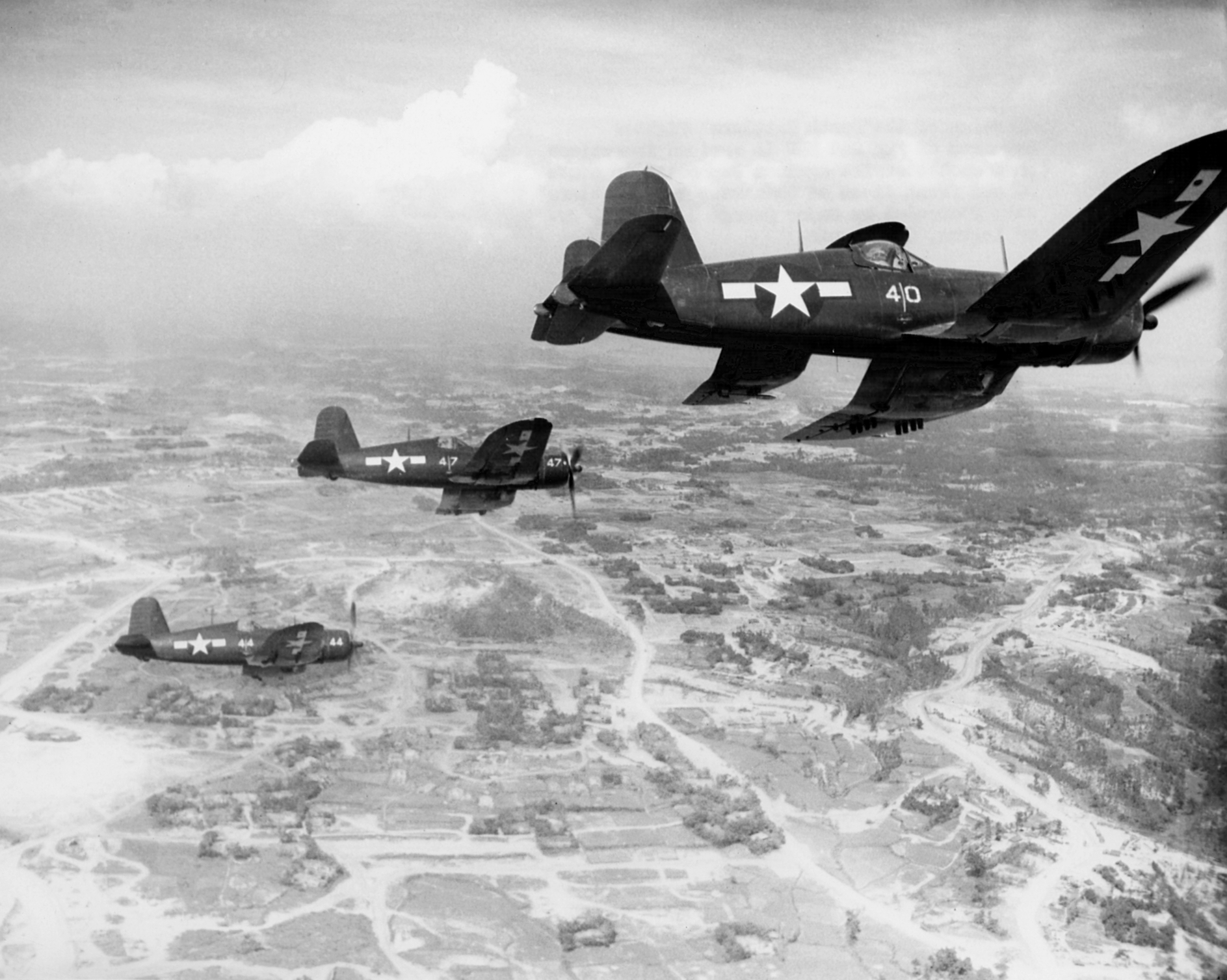 FG-1D Corsair fighters of US Marine Corps squadron VMF-323 in flight over Okinawa, Japan, 10 Jun 1945