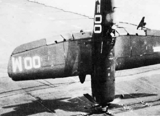 F4U-4 Corsair fighter after a bad landing aboard USS Coral Sea in the Mediterranean Sea, 2 Aug 1950; seen in Jul 1978 issue of US Navy publication Naval Aviation News