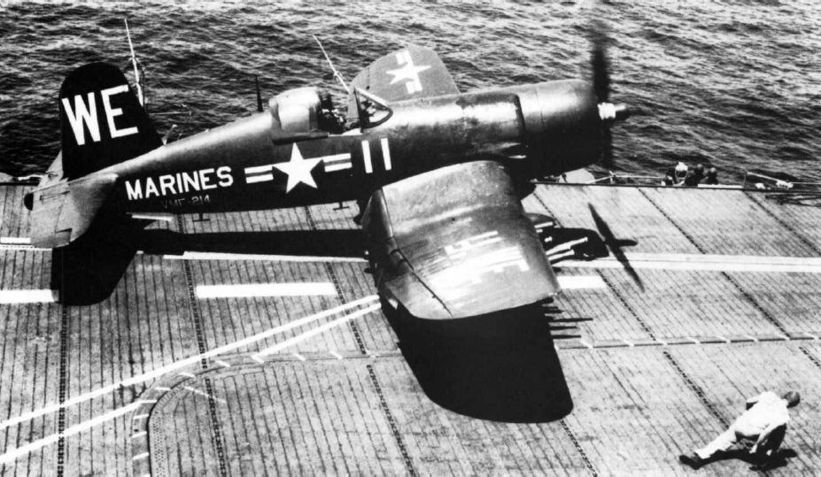 F4U-4C Corsair fighter of US Marine Corps squadron VMF-214 taking off from USS Sicily, off Korea, 1950-1953; seen in USMC publication Corsairs to Panthers-Marine Aviation in Korea