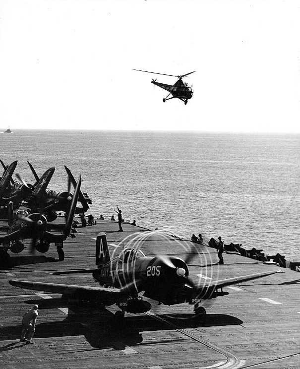 F4U-4 Corsair fighters preparing to launch from USS Boxer off Korea, Jul 1951