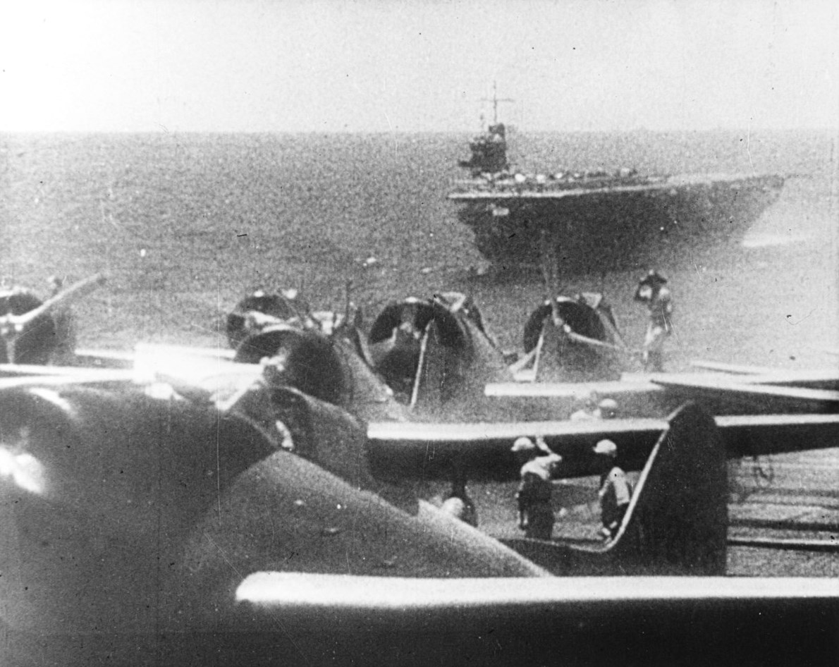 D3A1 dive bombers preparing to take off from Akagi to attack Pearl Harbor, US Territory of Hawaii, 7 Dec 1941; carrier Soryu in background