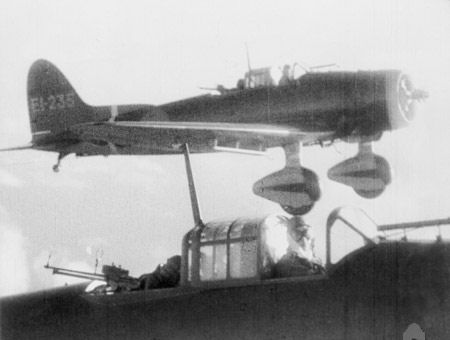 Akimoto Tamotsu and Koitabashi Hiroshi flying their D3A carrier dive bomber (foreground) returning to carrier Shokaku after attacking USS Enterprise during Battle of the Eastern Solomons, 24 Aug 1942