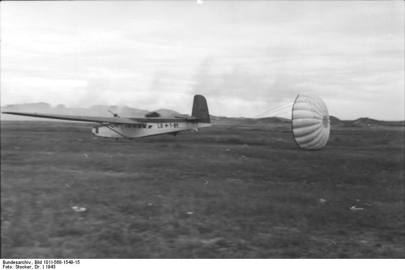 German DFS 230 glider landing, Italy, 1943, photo 2 of 2; note use of parachute to decelerate