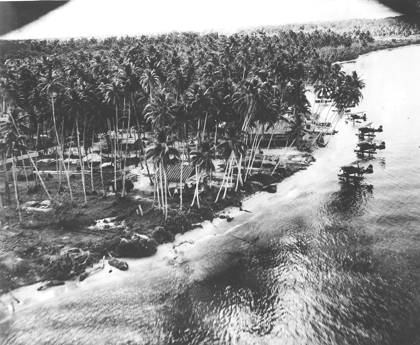 US reconnaissance photo of the Japanese seaplane base at Kavieng Harbor, New Ireland, 15 Feb 1944; note Mitsubishi F1M2 Float Planes, US code named 'Pete'