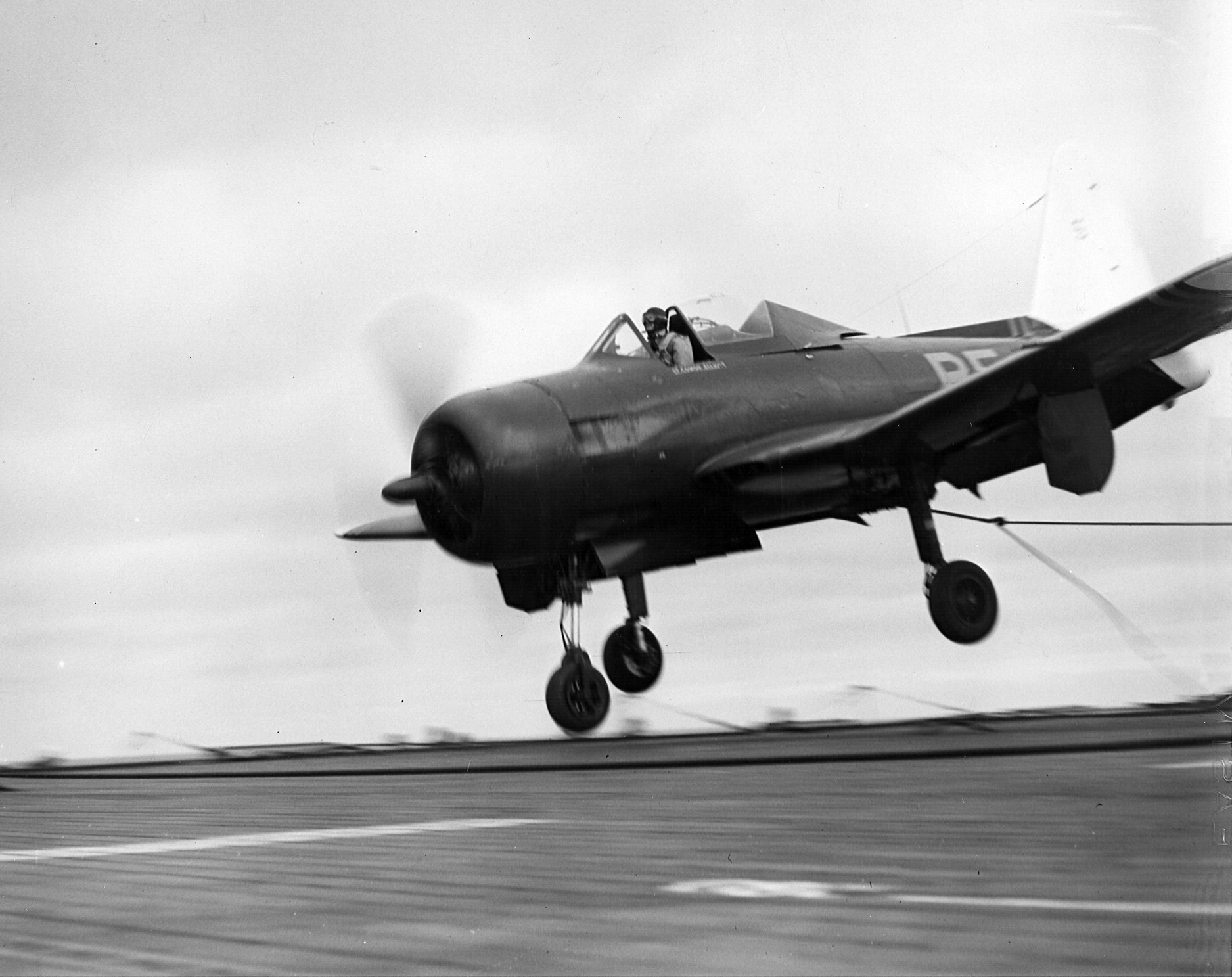 FR-1 Fireball fighter of US Navy squadron VF-41 landing aboard escort carrier USS Bairoko, 13 Mar 1946; this aircraft's nose gear would collapse moments after this photo was taken
