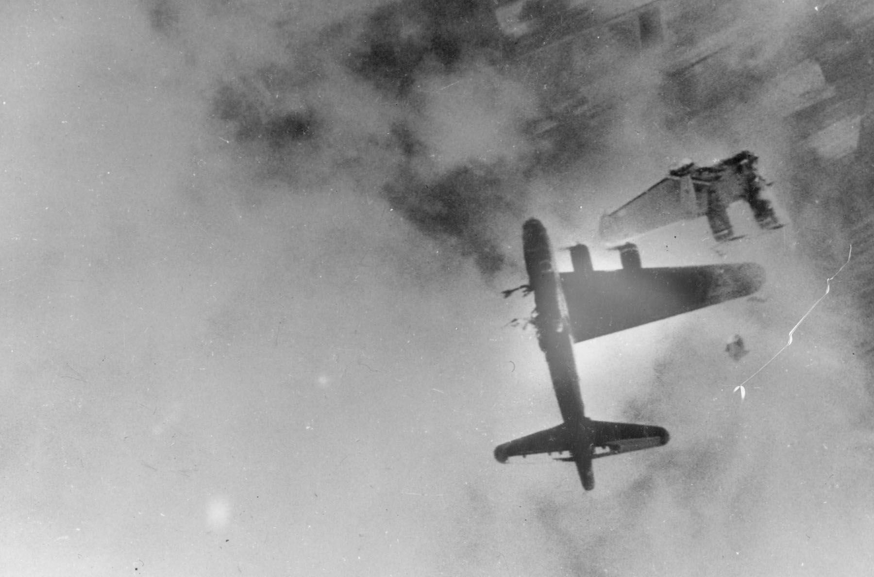 B-17G Flying Fortress 'Wee-Willie' of 322nd Bomber Squadron of USAAF 91st Bomber Group losing a wing from flak fire over Stendal, Germany, 8 Apr 1945; 8 were killed; pilot and 1 crewman survived