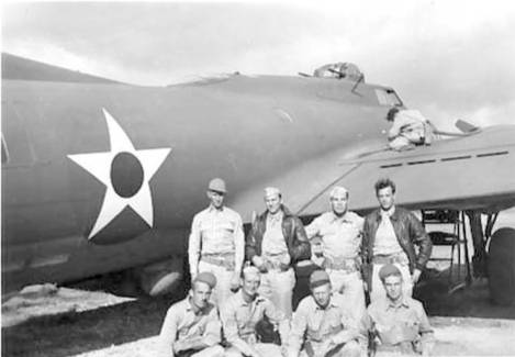 T/Sgt. Raymond A. Heilman, Jr. and fellow crew of the 11th Bomber Group Heavy of the USAAF 42nd Squadron posing by a B-17 Flying Fortress bomber, US Territory of Hawaii, circa late 1941 or early 1942