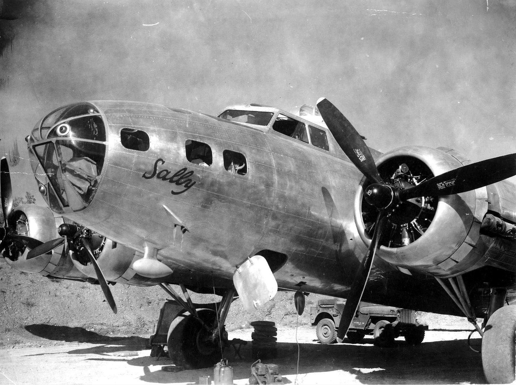 B-17E 'Sally' of US 5th Air Force based between Townsville, Queensland, Australia and Port Moresby, New Guinea; this aircraft was used exclusively to transport Major General George Kenney; note Jeep