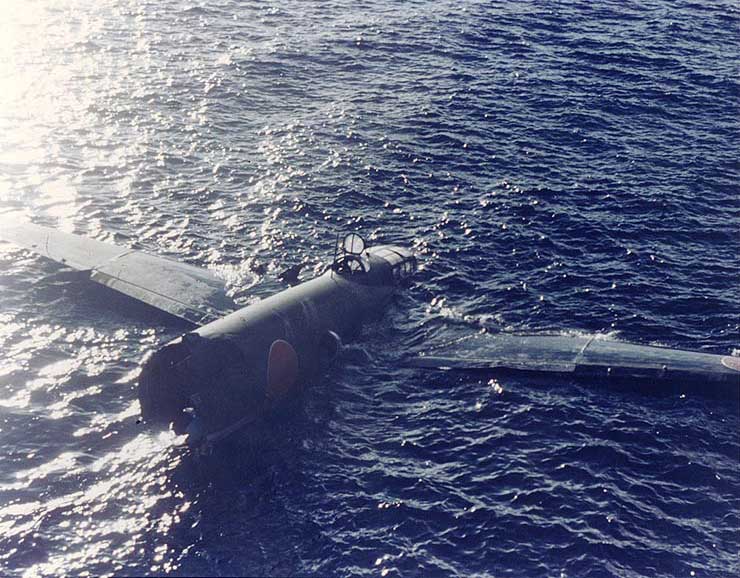 Floating Japanese G4M1 bomber off Tulagi, Solomon Islands, 8 Aug 1942 as seen from the destroyer USS Ellet. The bomber was shot down during an aerial torpedo attack on the Allied shipping off Tulagi. Photo 1 of 2