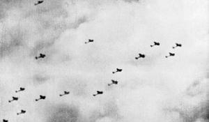 Formations of German He 111 bombers flying over Britain, seen through the the gun camera of British Pilot Officer J. D. Bisdee's Spitfire fighter of No. 609 Squadron RAF, 26 Sep 1940