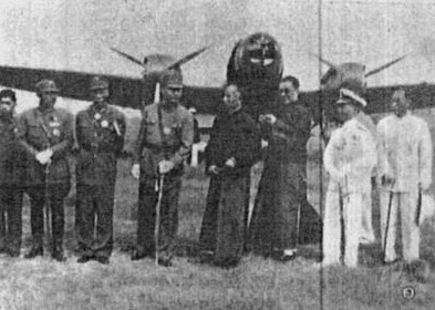 Chinese military officers and civilian officials with a He 111 A-0 bomber, 1930s