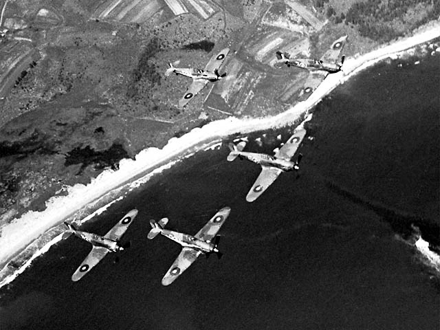 Canadian Hurricane fighters in flight over shore lines, date unknown