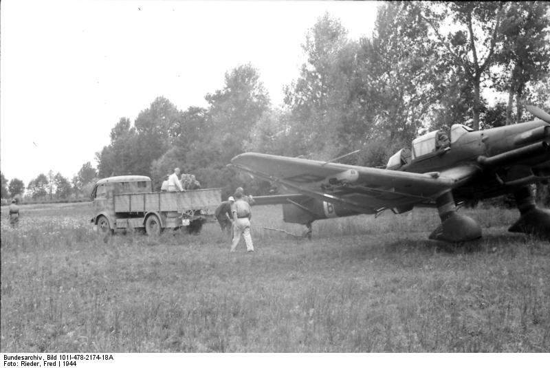 German Ju 87 Stuka dive bomber in a field near Florence or Ravenna, Italy, 1944, photo 1 of 2