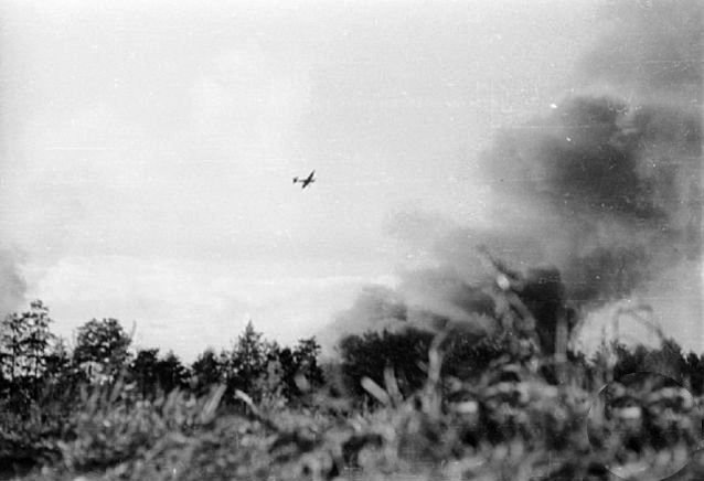 German Ju 87 Stuka dive bomber flying near the field headquarters of Polish Kampinos Regiment at Wiersze village 27 kilometers northwest of Warsaw, Poland, 27 Sep 1944