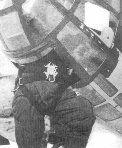 Nose gunner of a Ki-48 aircraft exiting his position, circa 1940s