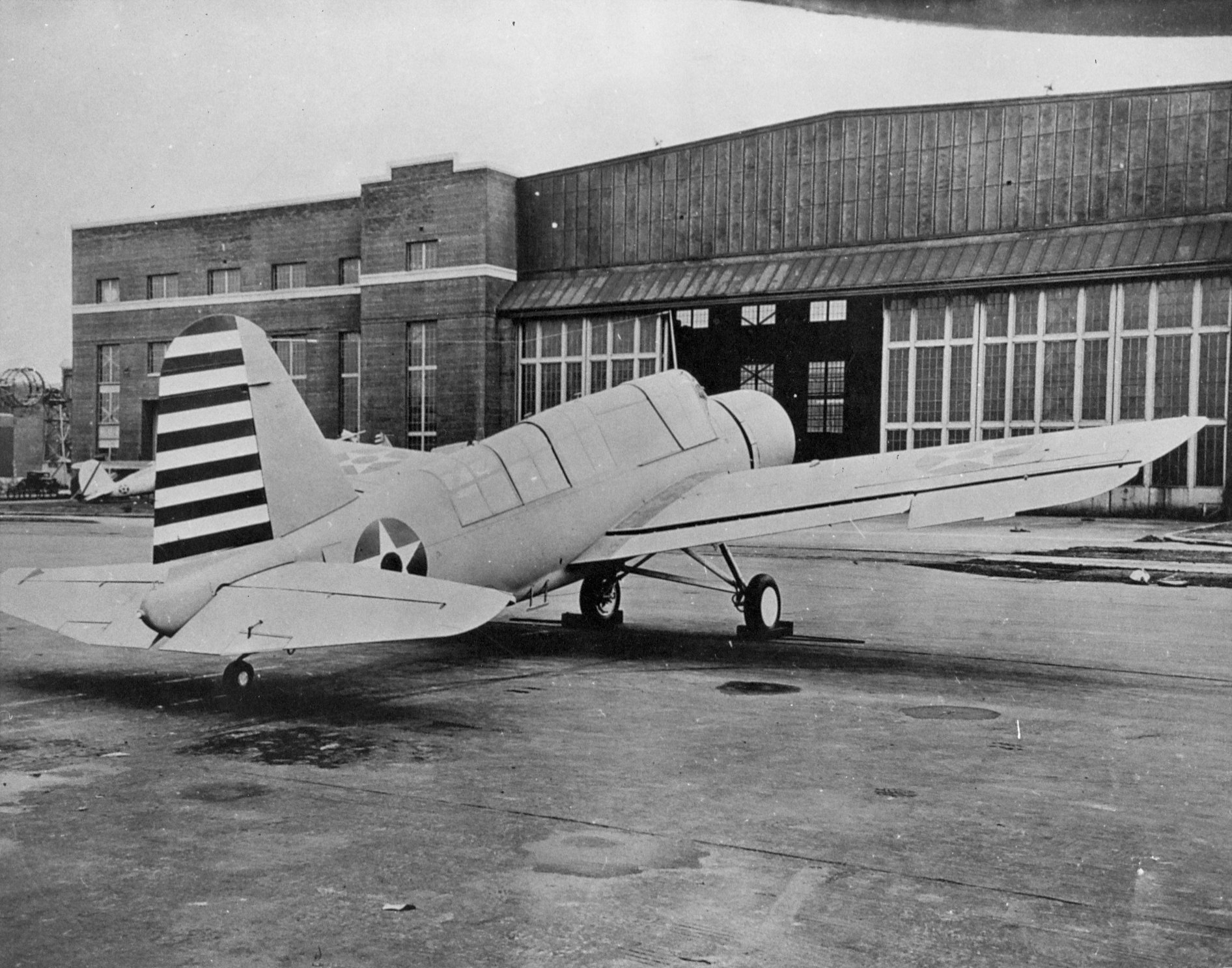 Wheeled variant of the Naval Aircraft Factory OS2N-1 Kingfisher (contract versions of the Vought OS2U-3) at rest at the Naval Aircraft Factory in Philadelphia, Pennsylvania, United States, 1942