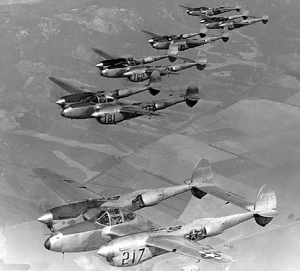 P-38L Lightning aircraft flying in formation during Lockheed test pilot Milo Burcham's funeral, southern California, United States, 25 Feb 1945