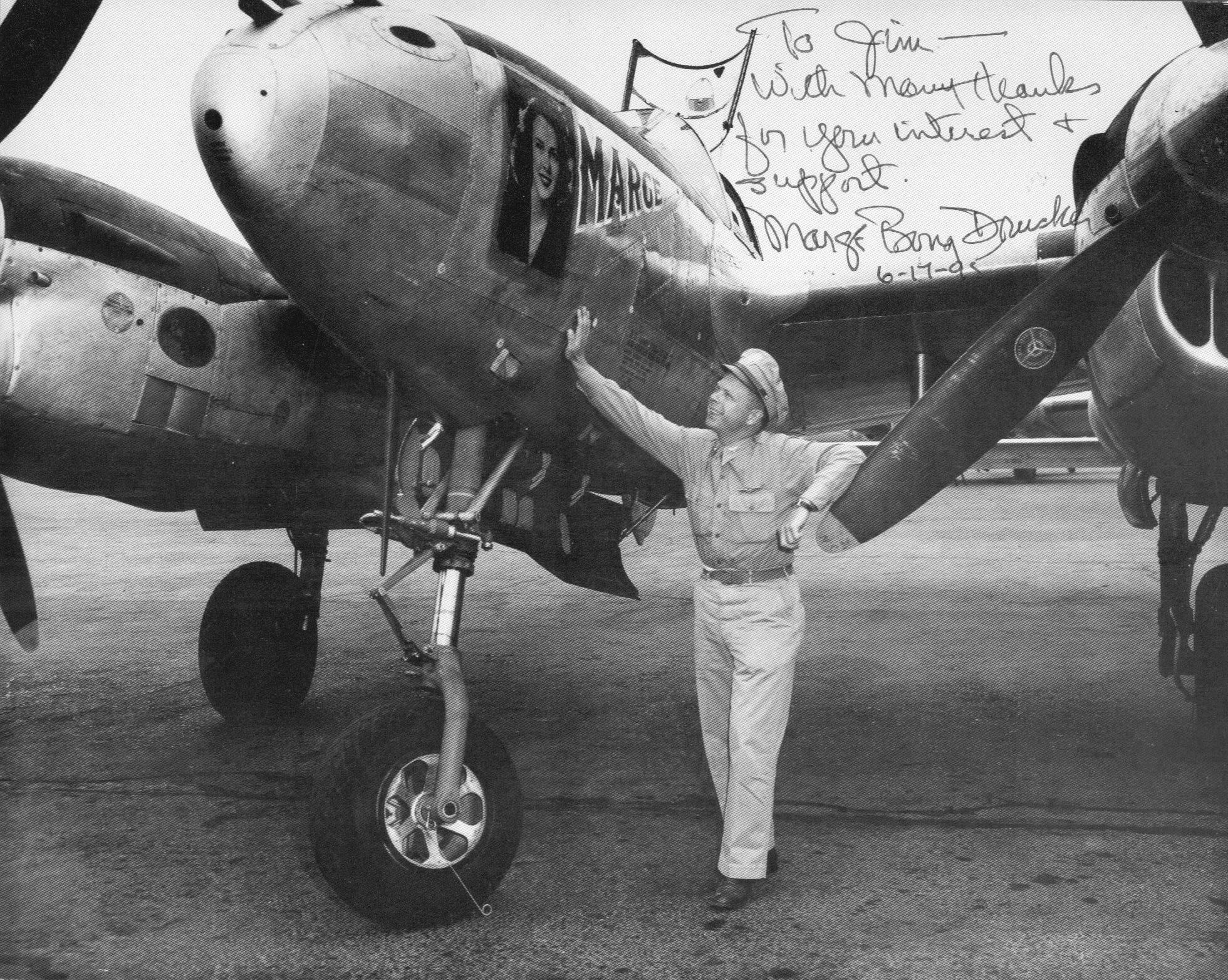 USAAF Major Richard Bong with his P-38 Lightning aircraft 'Marge', date unknown