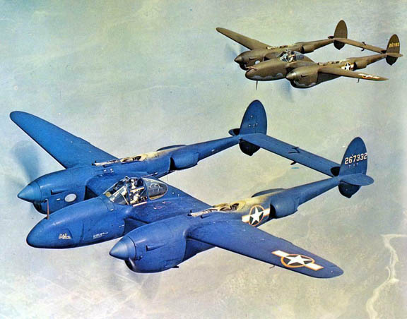 F-5B-1-LO Lightning aircraft (photo reconnaissance variant of the P-38J) painted PRU blue  in flight, 1943; photo 2 of 2; note accompanying P-38J aircraft in usual olive drab