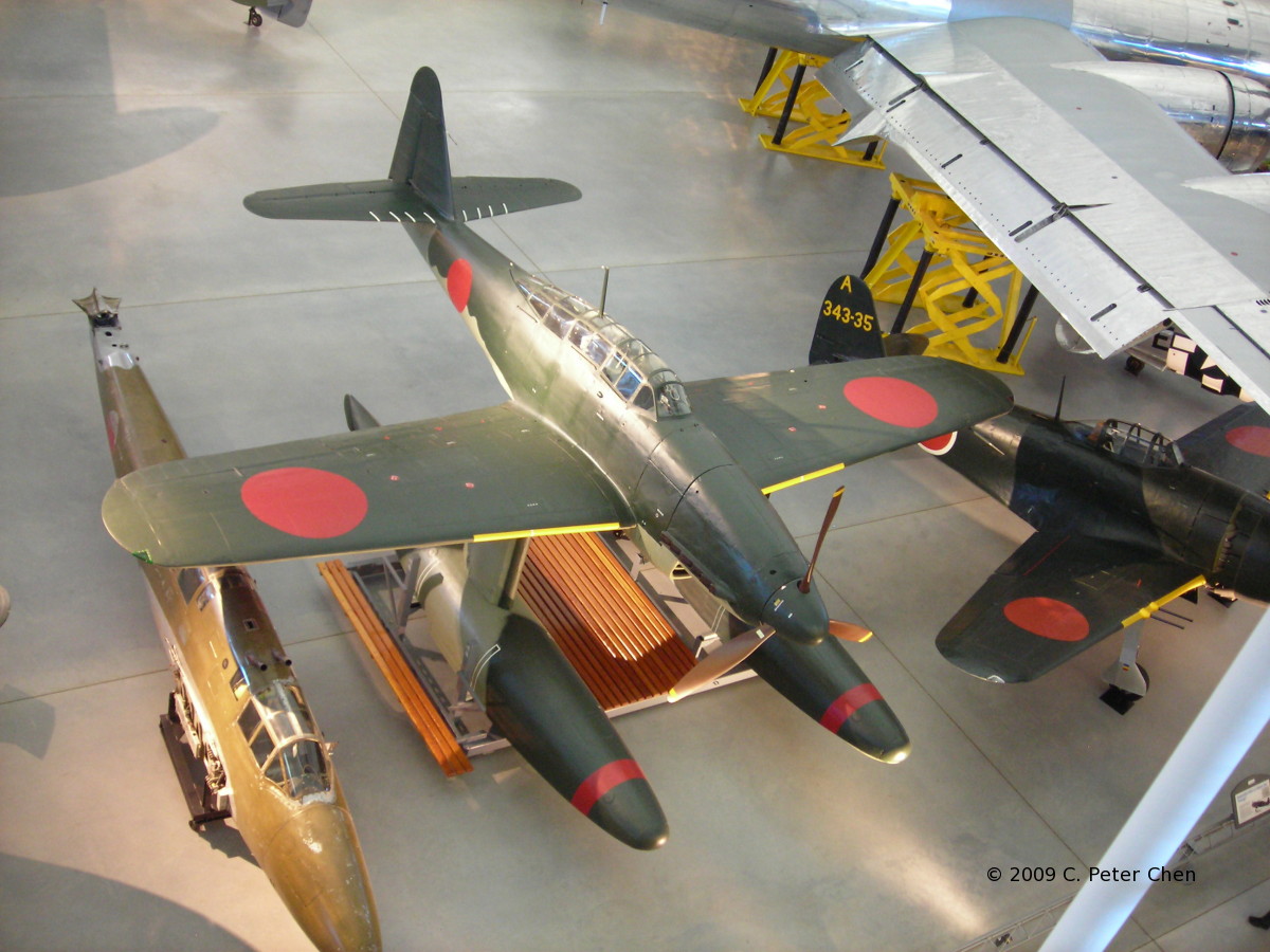 Ki-45 Toryu fuselage, M6A1 Seiran, and N1K2 Shiden on display at the Smithsonian Air and Space Museum Udvar-Hazy Center, Chantilly, Virginia, United States, 26 Apr 2009; note wing of B-29 Enola Gay
