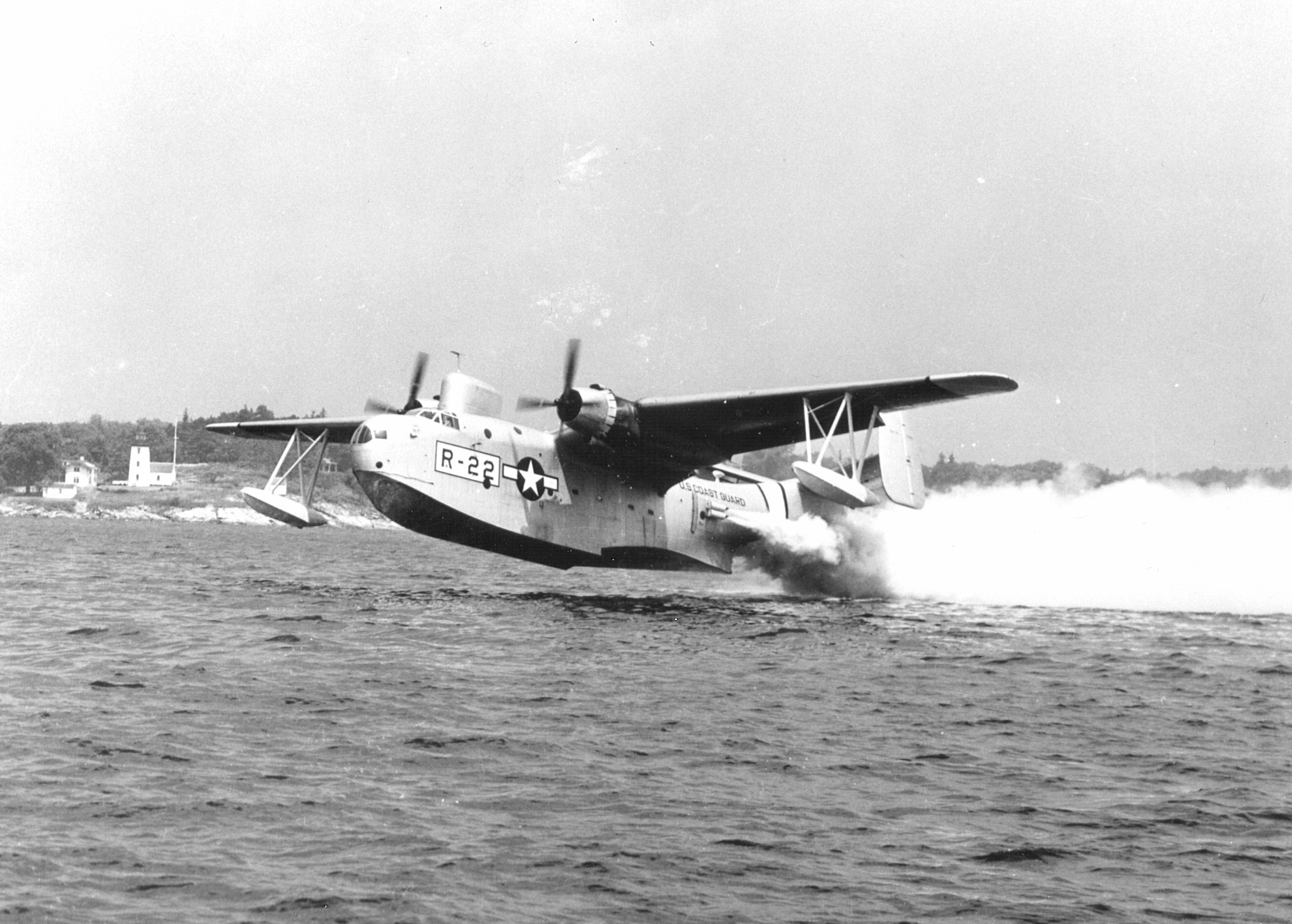 US Coast Guard PBM Mariner aircraft taking off from the water, circa late 1940s