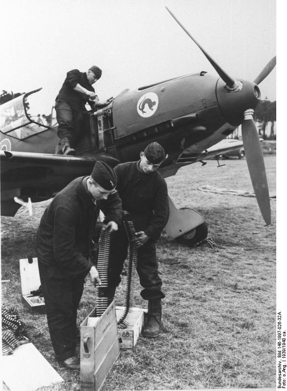 German armorers and mechanic working on a Bf 109 fighter of JG 20, 1939-1940