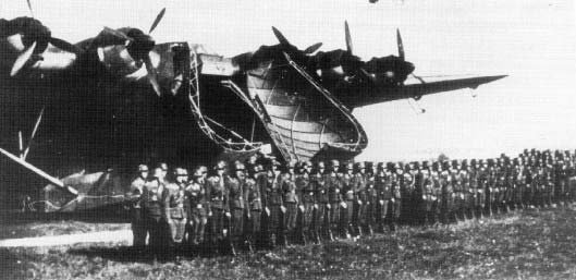 German soldiers being reviewed in front of a Me 323 Gigant aircraft, date unknown