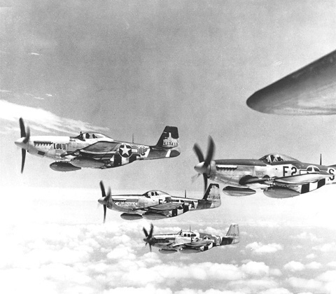 A flight of P-51 Mustang aircraft, possibly over Europe, 6 Jun-9 Aug 1944