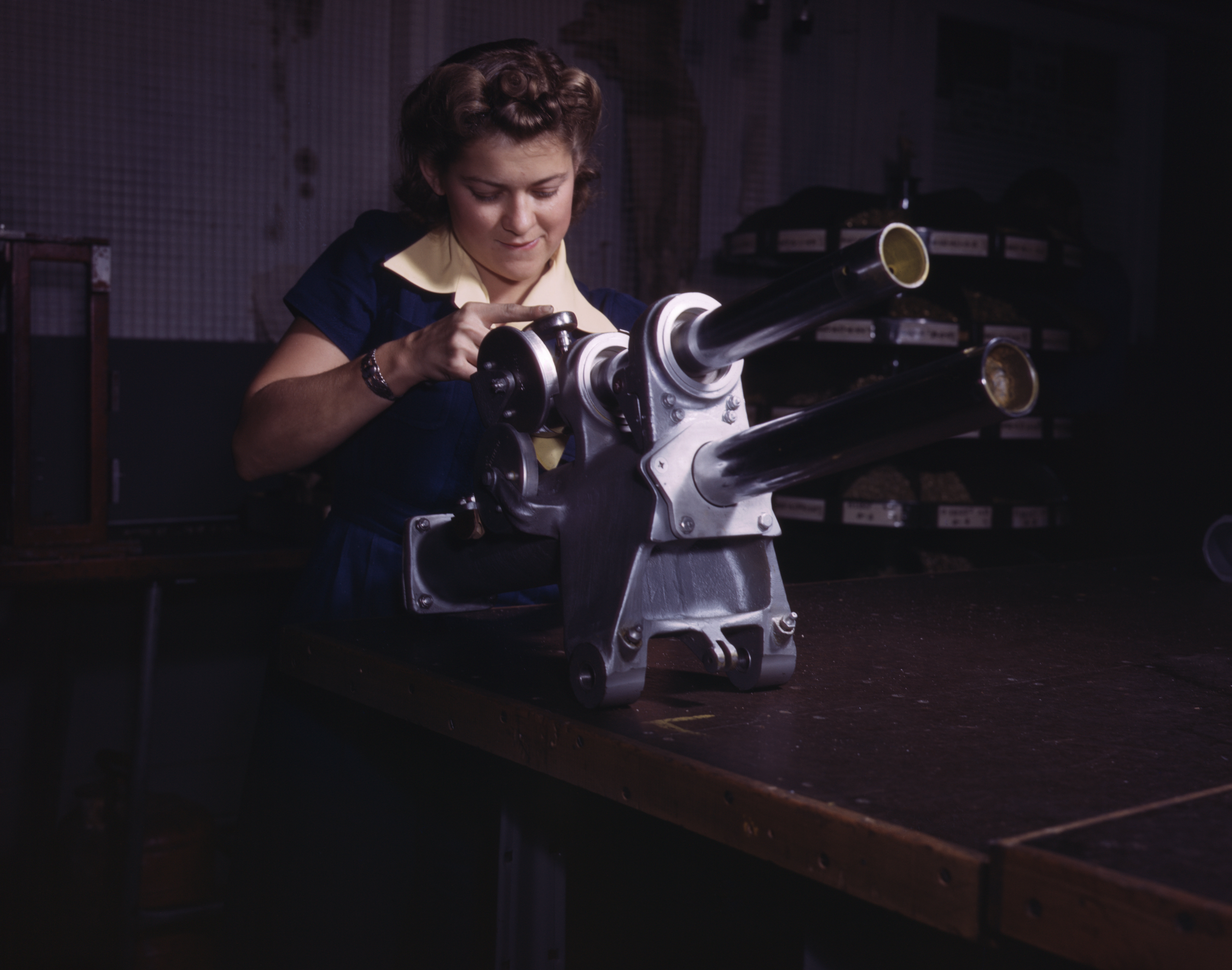 An American woman working on the landing gear of a P-51 Mustang aircraft at the North American Aviation plant, Inglewood, California, United States, Oct 1942