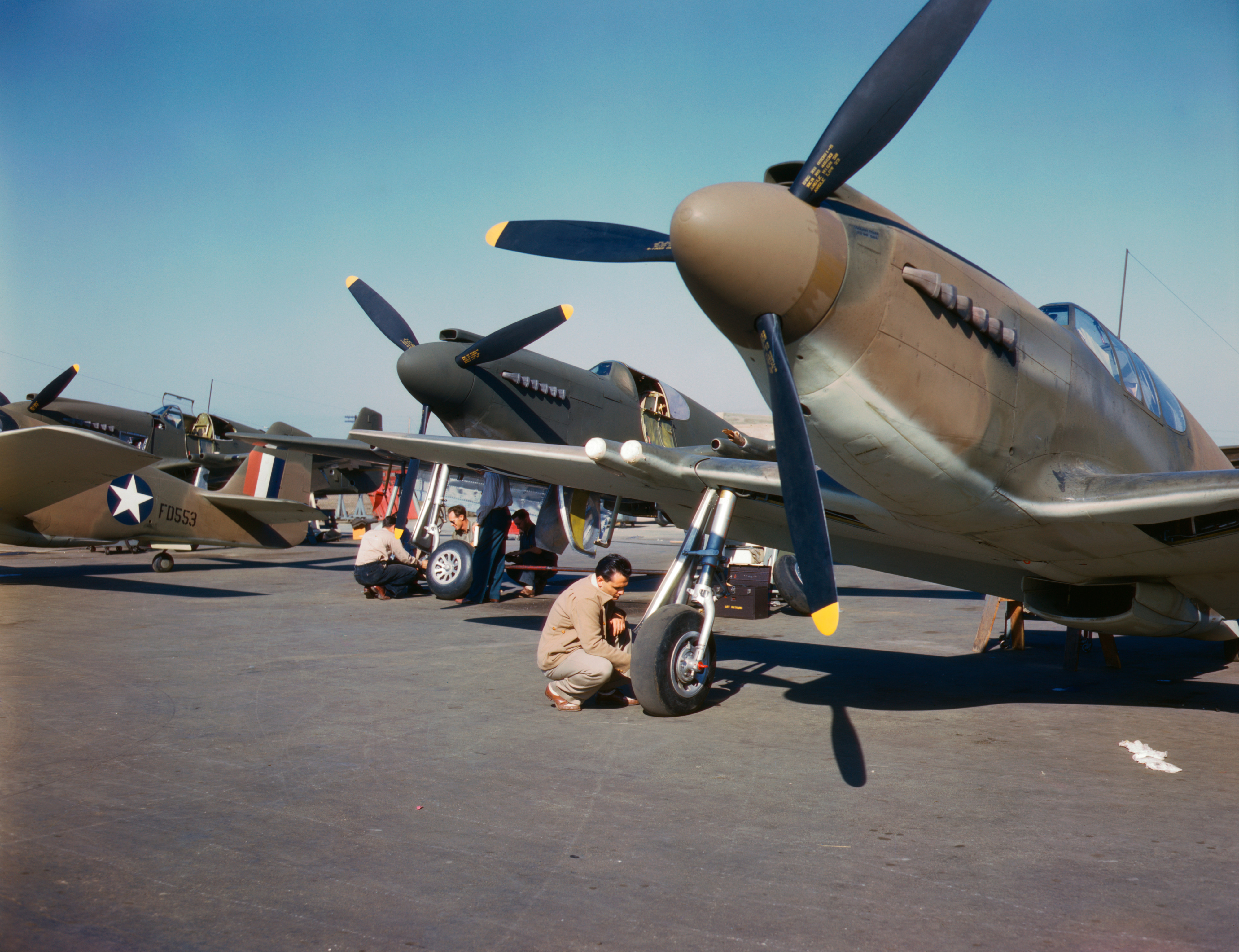 P-51 Mustang fighters being prepared for test flight, North American Aviation, Inglewood, California, United States, Oct 1942