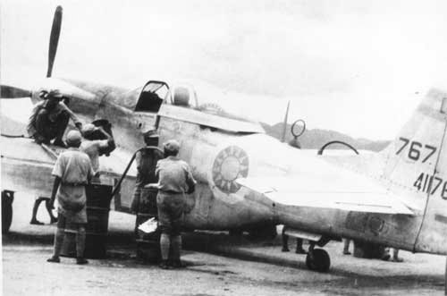 Chinese Air Force P-51K Mustang fighter being refueled, China, 1945