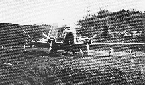 Damaged DC-3 aircraft at Suifu, Sichuan Province, China, 1941